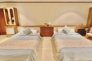 Cama ou camas em um quarto em イリワ -stay&coffee iriwa-