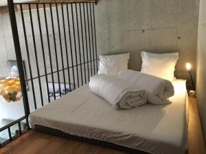 A bed or beds in a room at Appartement Hauser