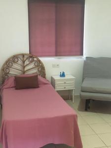 Postel nebo postele na pokoji v ubytování 2 Bedroom Apartment Jardines Canarios Los Cristianos Tenerife