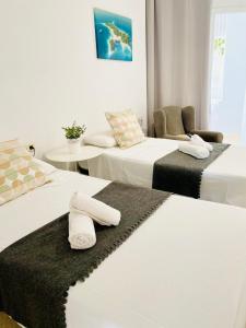Posteľ alebo postele v izbe v ubytovaní Primera línea de mar ! Fantástico apartamento