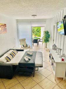 Televízia a/alebo spoločenská miestnosť v ubytovaní Primera línea de mar ! Fantástico apartamento