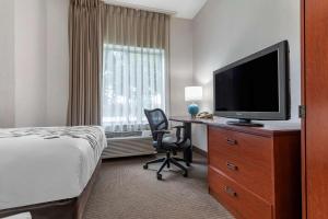 TV a/nebo společenská místnost v ubytování Sleep Inn