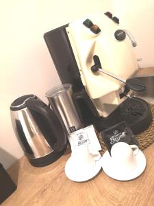 a coffee maker sitting on top of a counter at Domus Leone Tre in Naples