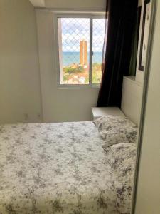 Postel nebo postele na pokoji v ubytování Spazzio PONTA NEGRA - APT 1302