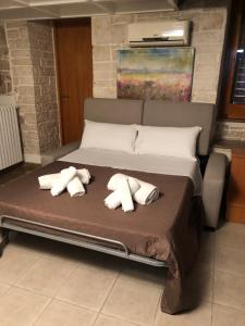 Posteľ alebo postele v izbe v ubytovaní Bella Vita Apartment