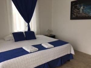 Voodi või voodid majutusasutuse Hotel Cally toas