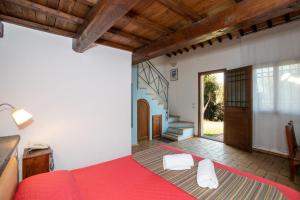Tempat tidur dalam kamar di Residenza d'Epoca Pietra Di Ponente