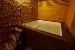 Koupelna v ubytování SPA&Hotel MŪSA PARADISE