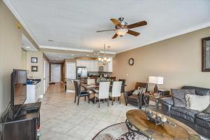 a living room with a couch and a ceiling fan at San Carlos Unit 902 in Gulf Shores
