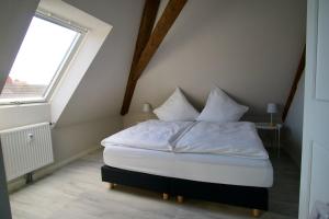 
Ein Bett oder Betten in einem Zimmer der Unterkunft Bärengasse Apartments
