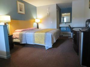 Ένα ή περισσότερα κρεβάτια σε δωμάτιο στο Travel Inn Beaumont