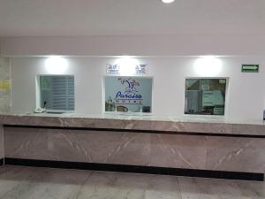 The lobby or reception area at Hotel Paraiso