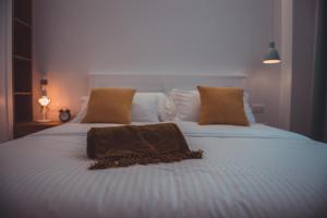 Кровать или кровати в номере TAM Serviced Apartment City Centre No1