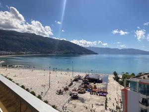a beach with a view of a body of water at Vlora Center Veranda in Vlorë