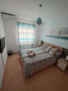 Posteľ alebo postele v izbe v ubytovaní CASA CLIMATIZADA VACACIONAL