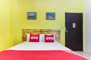 Postel nebo postele na pokoji v ubytování Yak Guesthouse