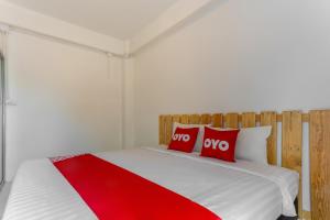 Postel nebo postele na pokoji v ubytování Yak Guesthouse