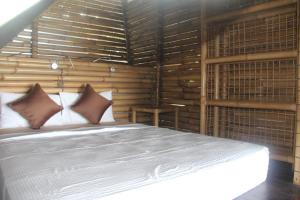 Postel nebo postele na pokoji v ubytování Agung View Villa, Nusa Penida