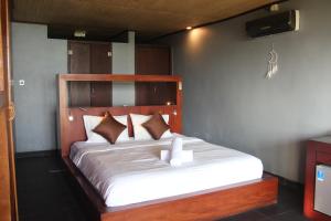 Postel nebo postele na pokoji v ubytování Agung View Villa, Nusa Penida