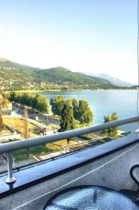 a view of a lake from a balcony at Fibos Studios in Ohrid