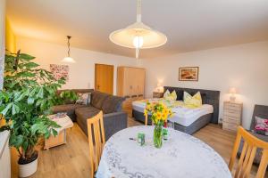 Postel nebo postele na pokoji v ubytování Gästehaus Regina