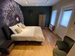 Voodi või voodid majutusasutuse B&B Het Doctershoes toas