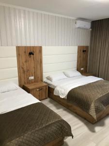 Postel nebo postele na pokoji v ubytování Holiday house + 37 fotografií