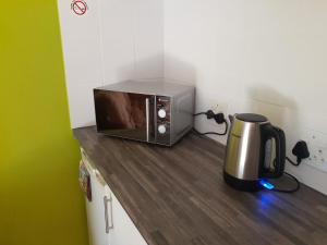 Kuchyň nebo kuchyňský kout v ubytování Elements Cape Town