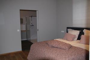 Voodi või voodid majutusasutuse B&B Het Doctershoes toas