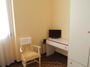 TV a/nebo společenská místnost v ubytování Albergo La Vela