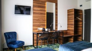Postel nebo postele na pokoji v ubytování Bloom Hotel Airport Okęcie