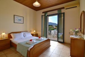 Postel nebo postele na pokoji v ubytování Christina Villas- Minoan inland