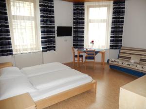 Ένα ή περισσότερα κρεβάτια σε δωμάτιο στο Hotel "Wilder Mann"