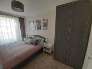 Posteľ alebo postele v izbe v ubytovaní Baltica Sea Apartment II