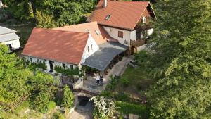 an overhead view of a house with a bridge at Pension Nippgen in Radebeul