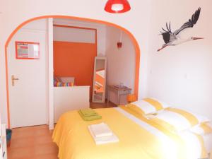 Katil atau katil-katil dalam bilik di Casa do Lado
