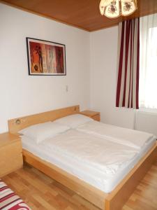 Ένα ή περισσότερα κρεβάτια σε δωμάτιο στο Hotel "Wilder Mann"