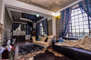 Posezení v ubytování Runda Lofts