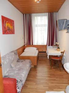 Ένα ή περισσότερα κρεβάτια σε δωμάτιο στο Hotel "Wilder Mann"