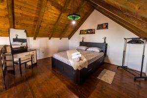 Cama ou camas em um quarto em Kuća za odmor Atar
