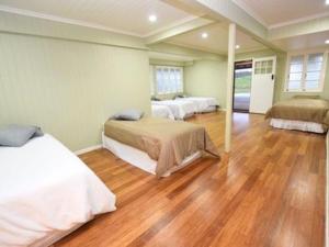 A bed or beds in a room at Bunya creek farm stay