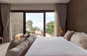 Ein Bett oder Betten in einem Zimmer der Unterkunft Chula Beach Resort