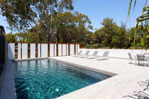 The swimming pool at or close to The Beach Houses Holiday Villas