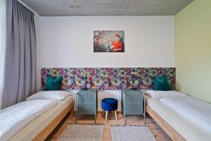Posteľ alebo postele v izbe v ubytovaní Villa Vogelnest