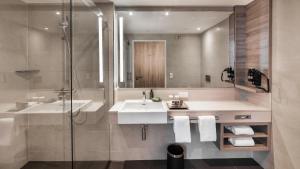 Holiday Inn Munich - City East, an IHG Hotel tesisinde bir banyo