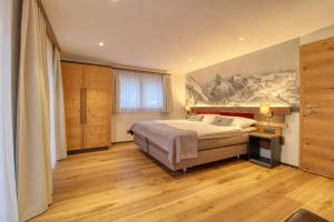 Letto o letti in una camera di Matterhorngruss Apartments