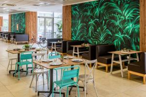Reštaurácia alebo iné gastronomické zariadenie v ubytovaní INNSiDE by Meliá Alcudia