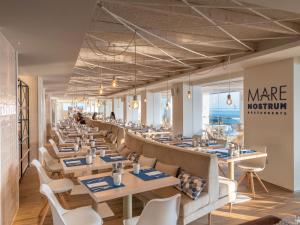 A seating area at Amàre Beach Hotel Ibiza - Adults Recommended