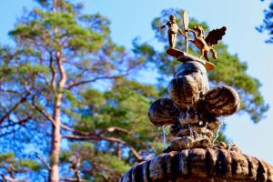 a close up of a fountain with a statue at Pegasa Pils Spa Hotel in Jūrmala