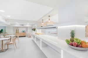 Kuchyň nebo kuchyňský kout v ubytování Hotel Almudaina